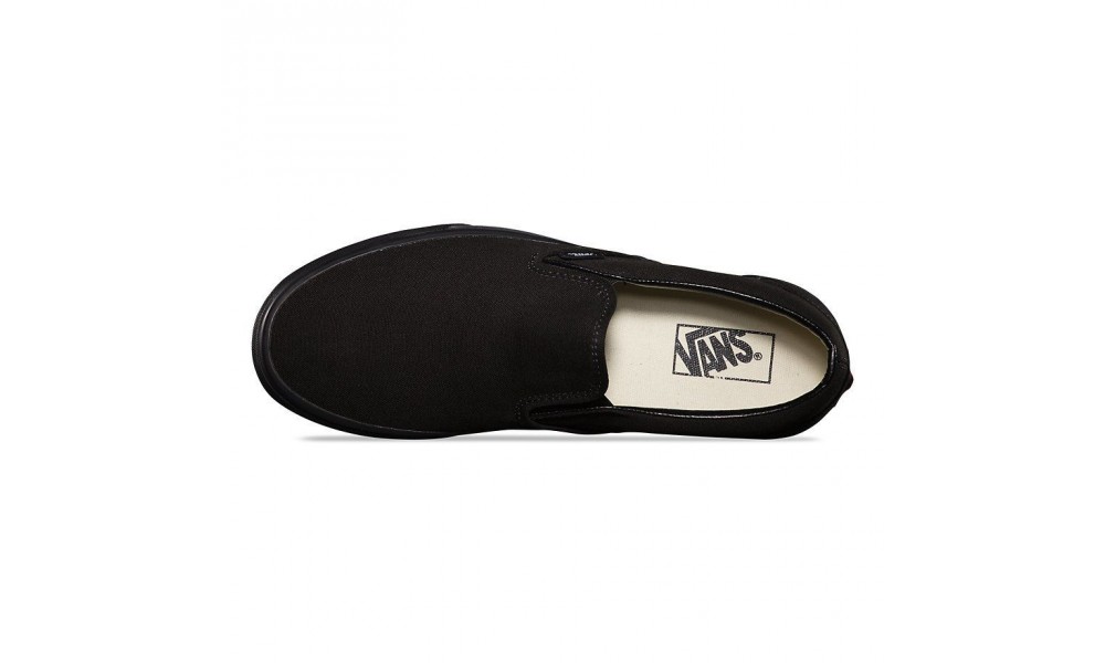 Solid black slip on vans online